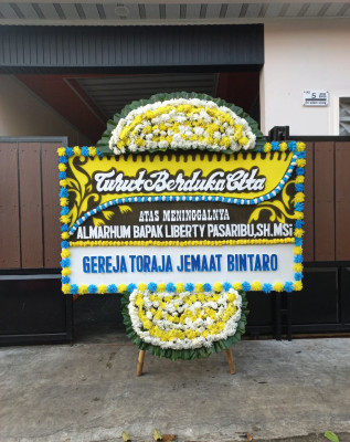 Papan Bunga Duka di Kepulauan Posek